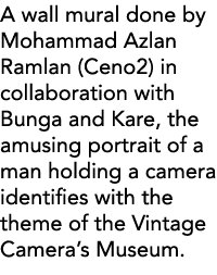 A wall mural done by Mohammad Azlan Ramlan (Ceno2) in collaboration with Bunga and Kare, the amusing portrait of a ma   